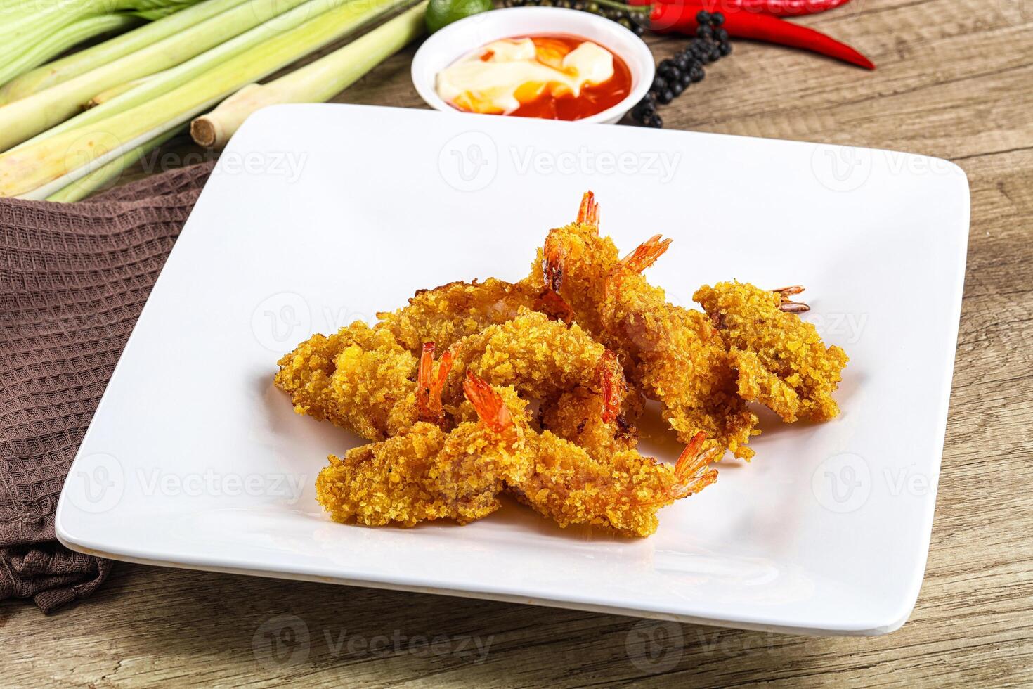 Golden deep prawn tempura wuth sauce photo