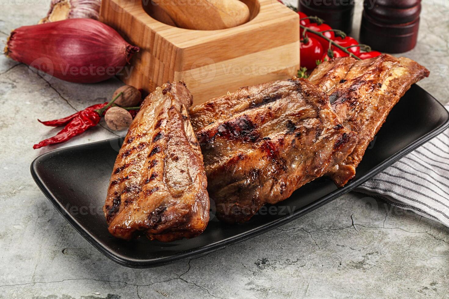 Grilled pork ribs with spices photo