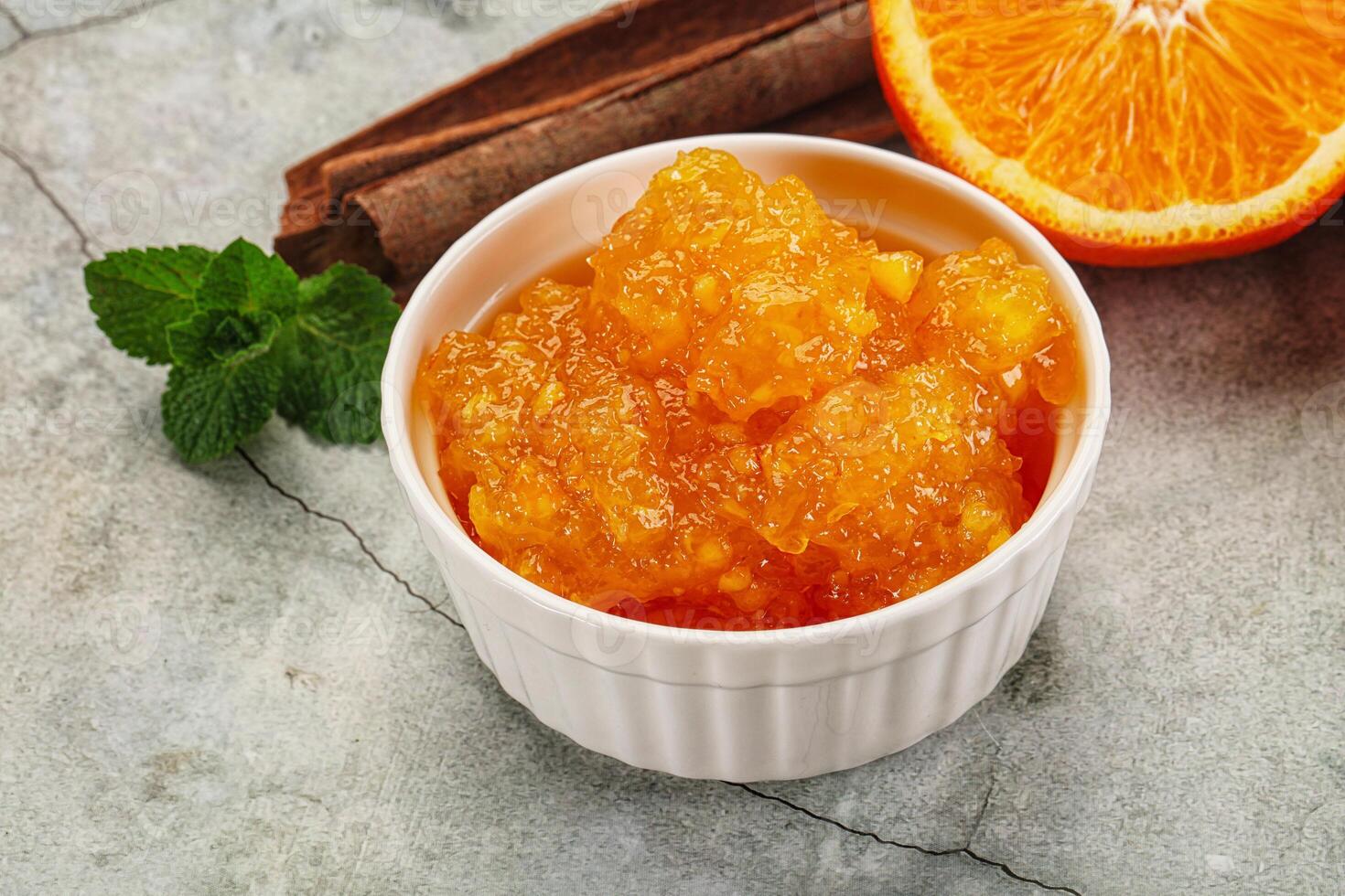 Tasty homemade Orange jam in the bowl photo