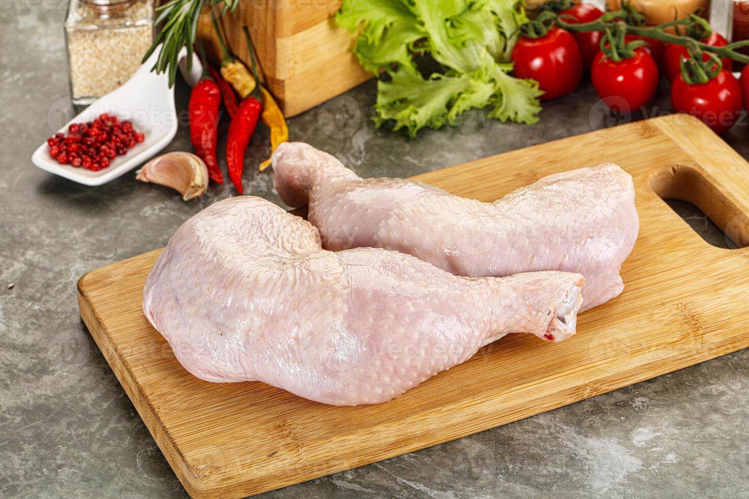 Raw chicken leg foe cooking photo