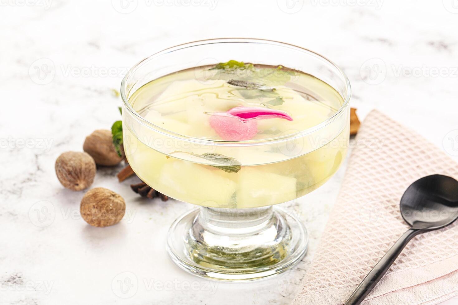Sweet pineapple jelly with mint photo