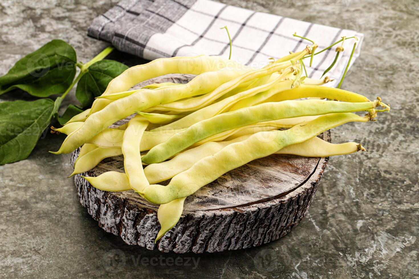 Raw green bean strings heap photo