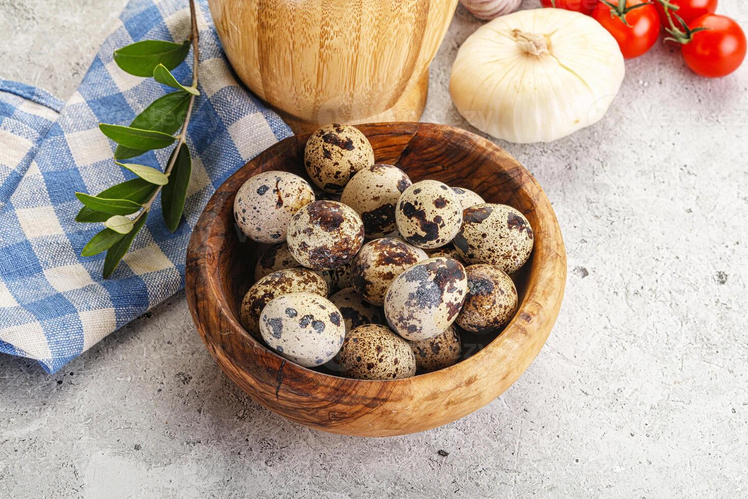 Raw quail eggs in the bowl photo