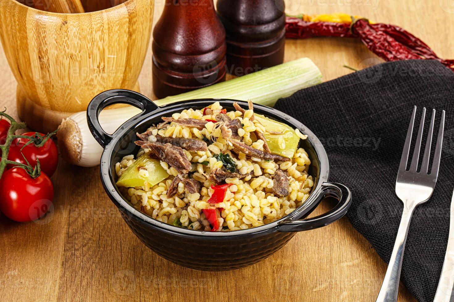 Bulgur with lamb and vegetables photo