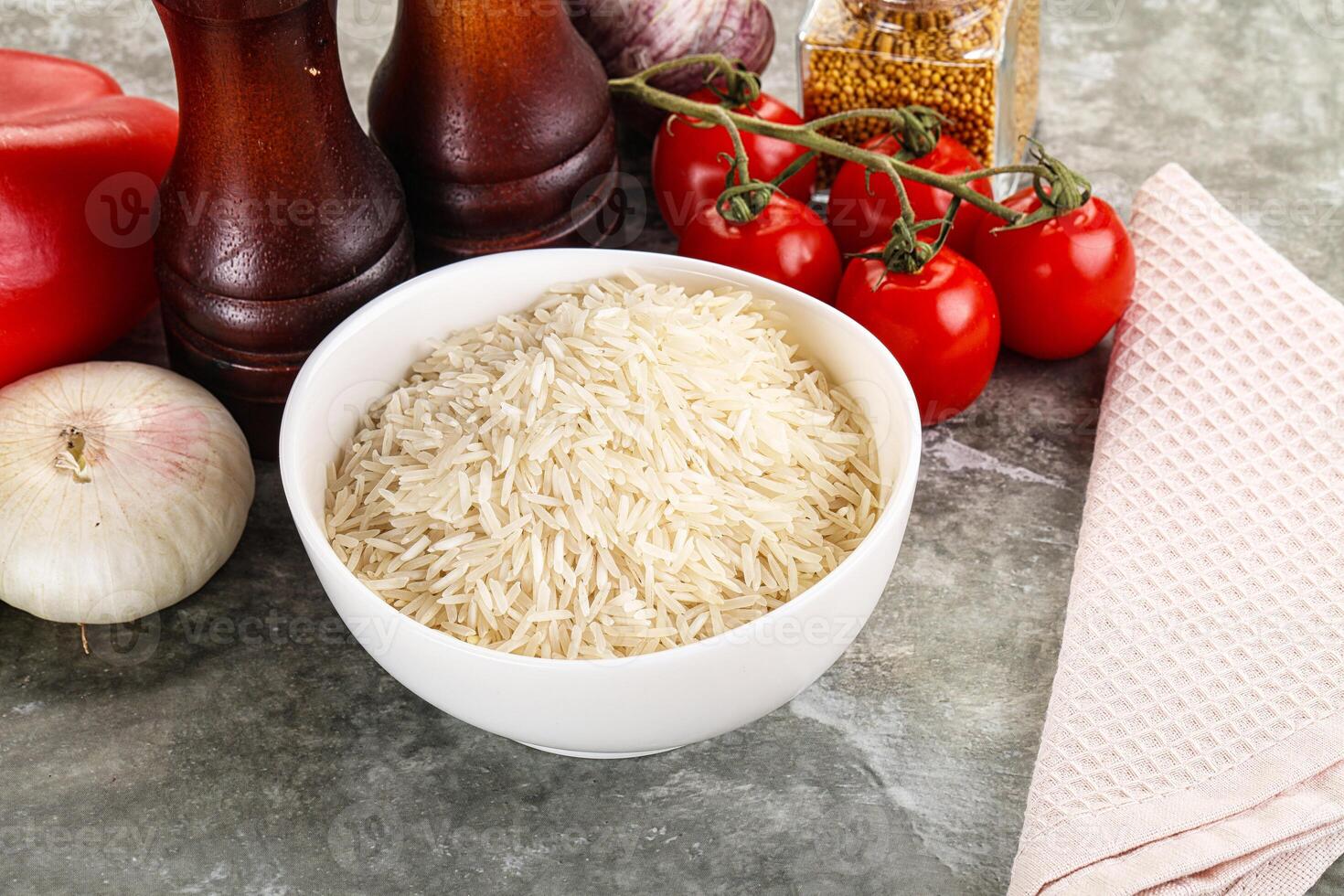 Raw delicous basmati rice heap photo