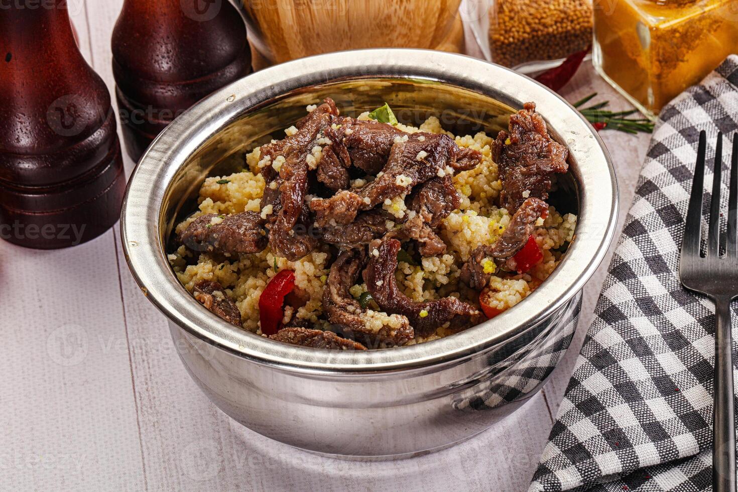 Traditional couscous with beef and vegetables photo