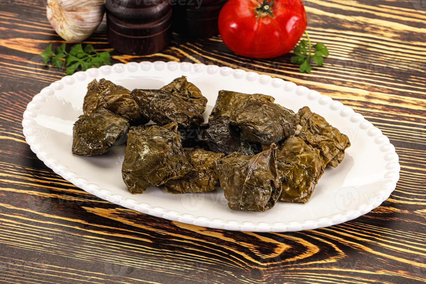 Stuffed dolma - meat in grape leaves photo