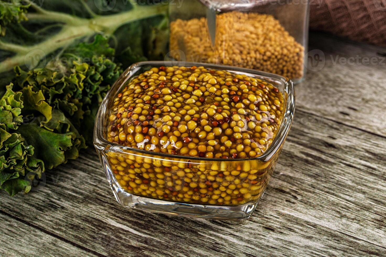 Mustard sauce with seeds in the bowl photo