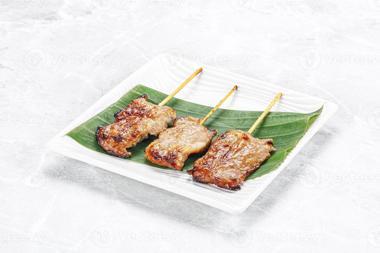 Thai cuisine - grilled pork skewer photo