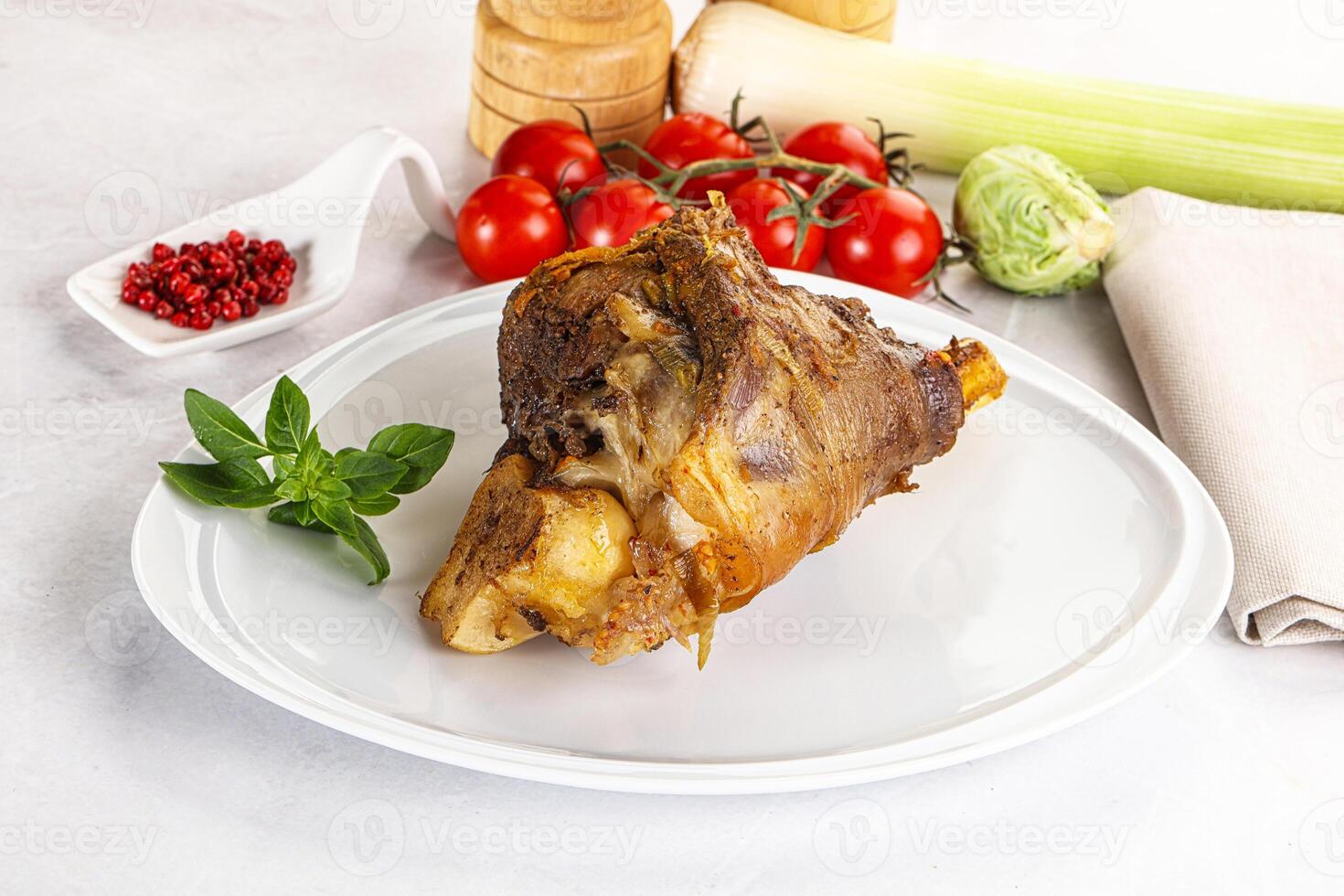 Baked Lamb shank with bone photo
