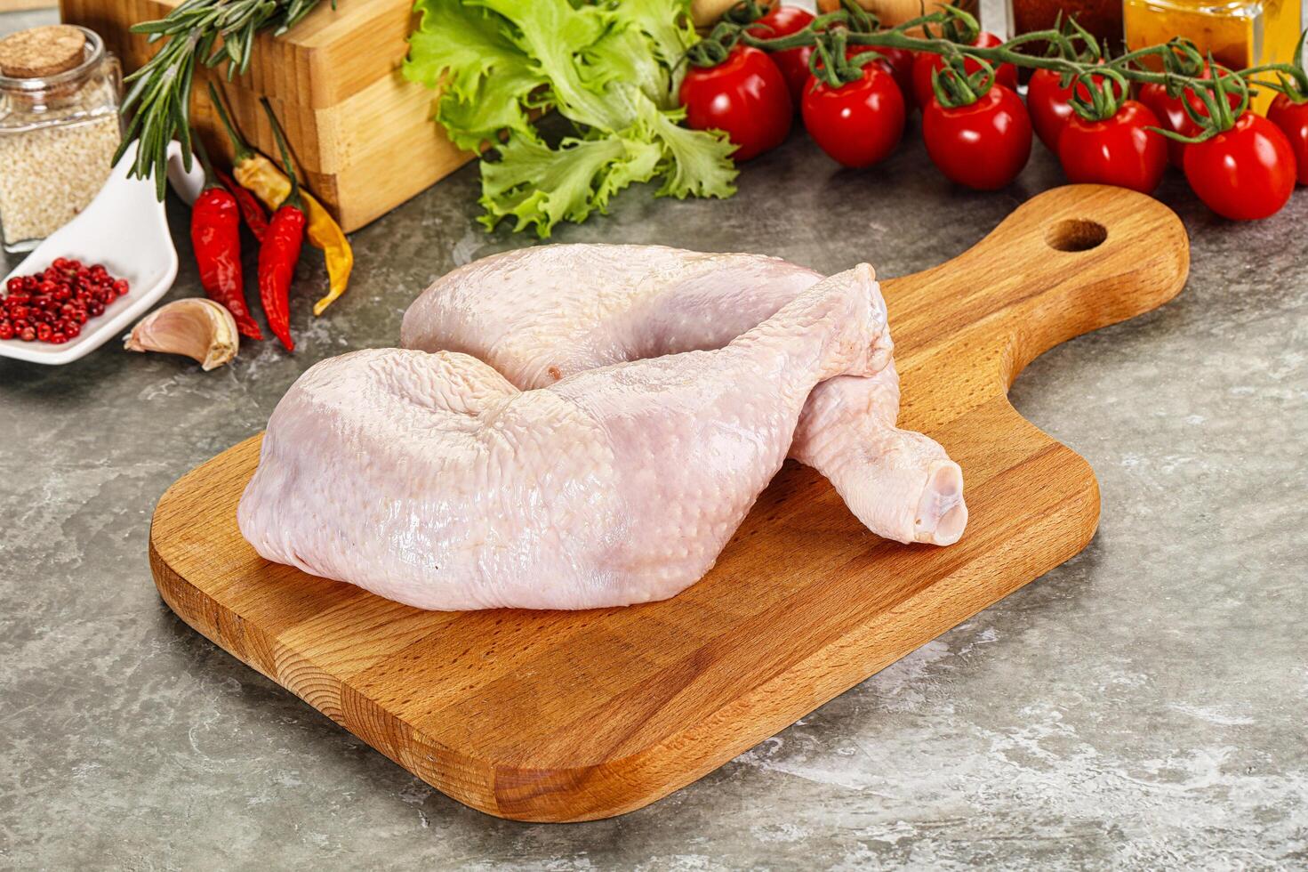 Raw chicken leg foe cooking photo