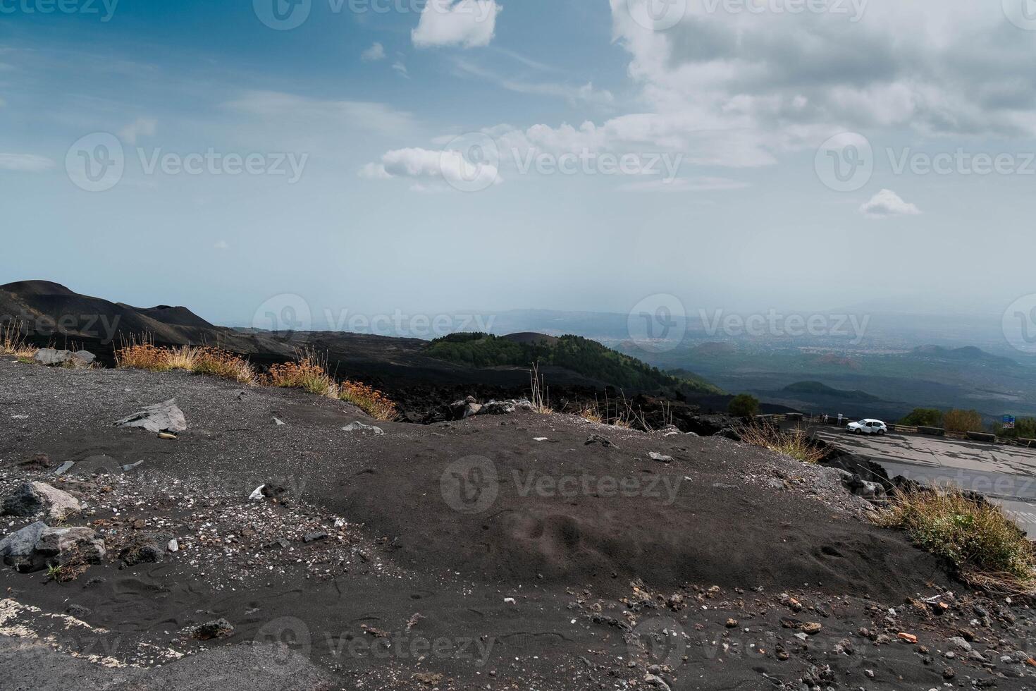 Etna, in Sicilian Muncibbe, is a complex stratovolcano of Sicily that originated in the Quaternary, and is the highest active volcano of the Eurasian plate. photo