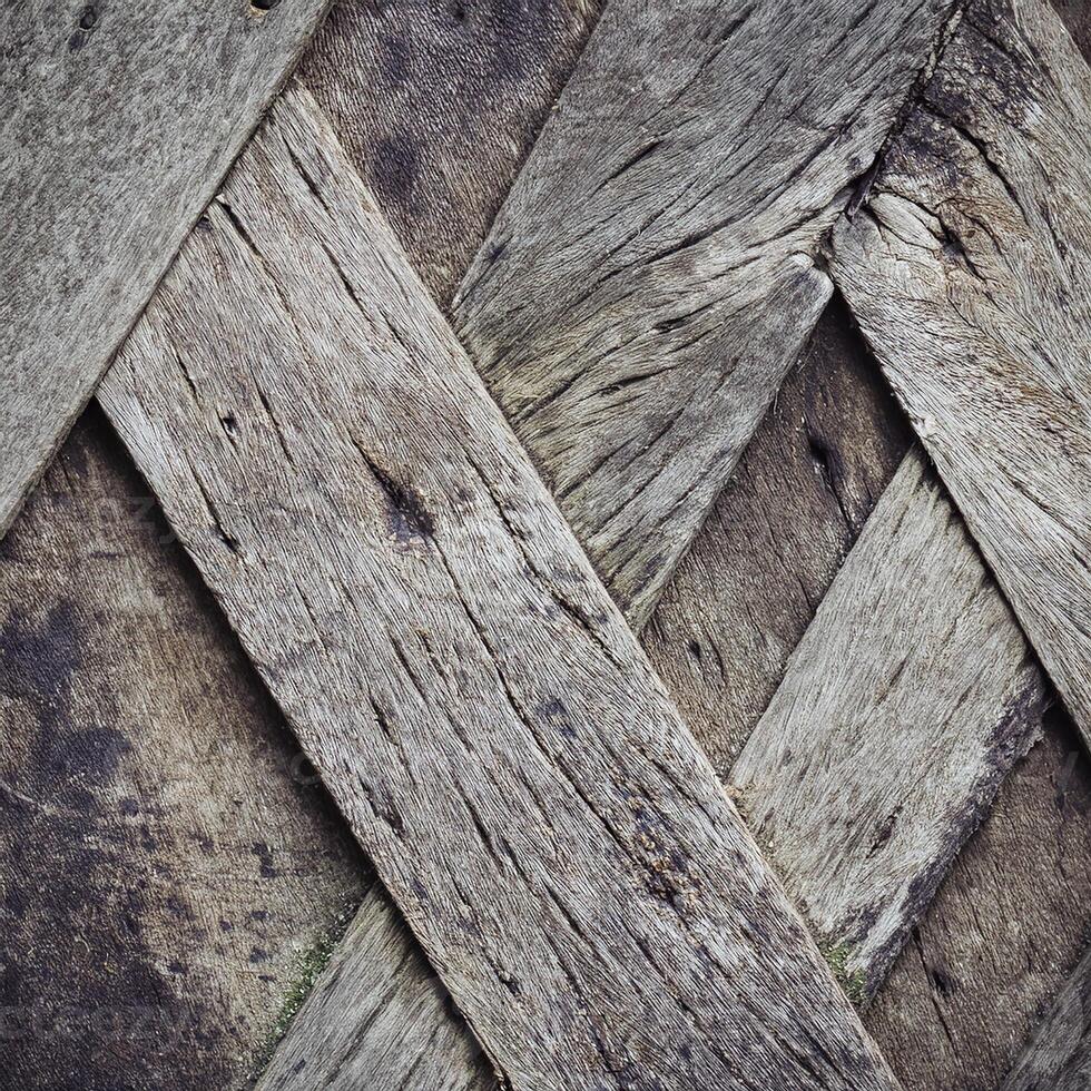A close up of a wooden wall with a cross pattern photo