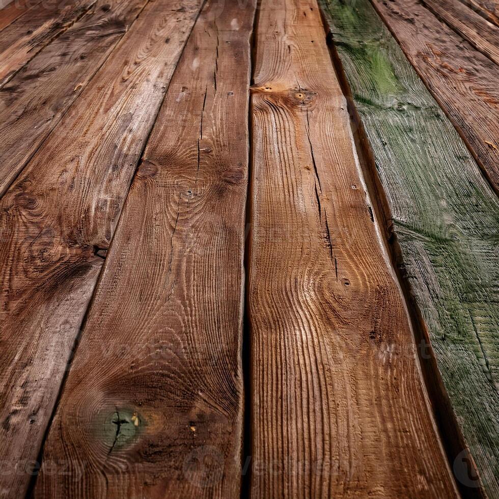 A close up of a wooden floor with green and brown paint photo