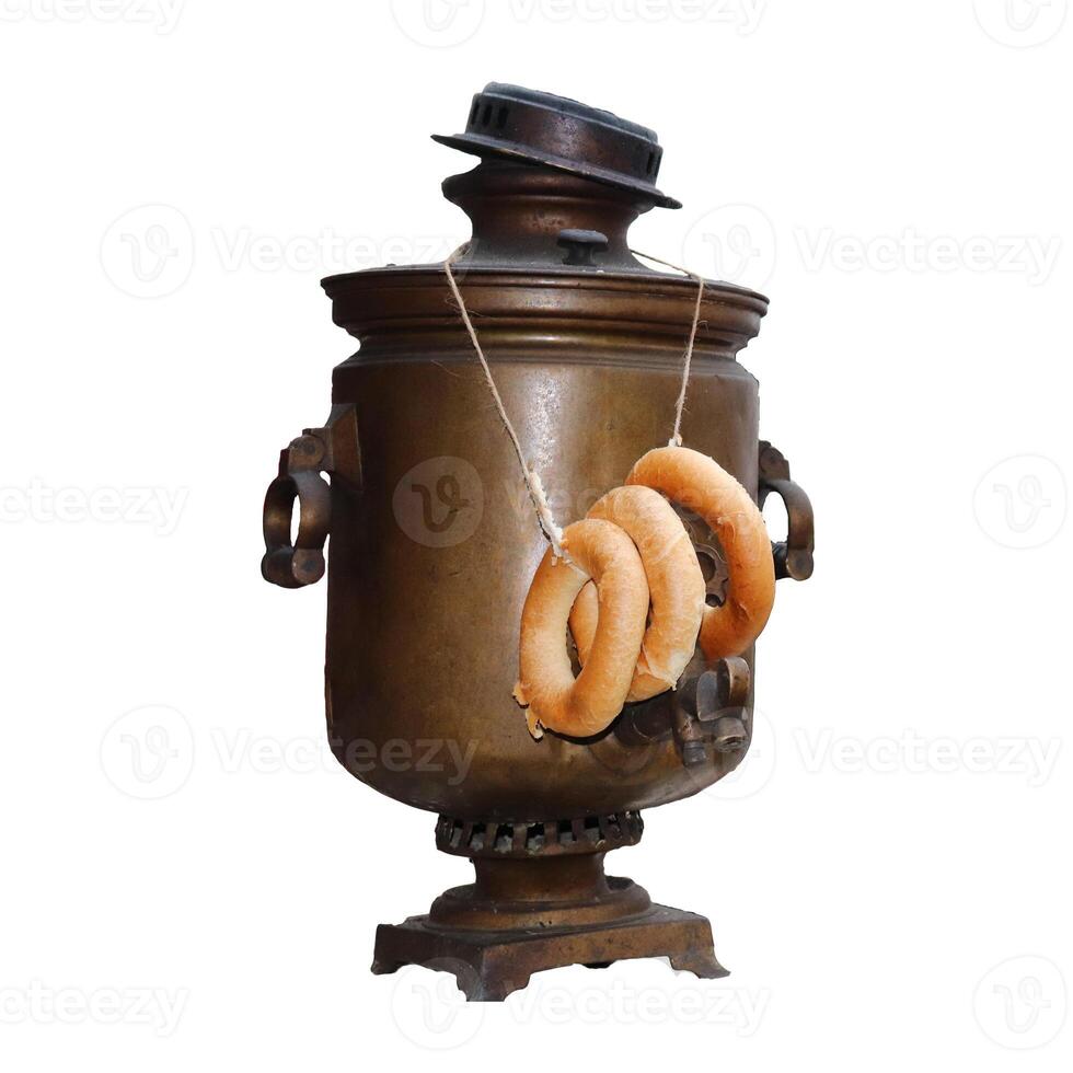 Cast iron coal russian samovar with a bunch of bagels - color photo, isolate for design photo