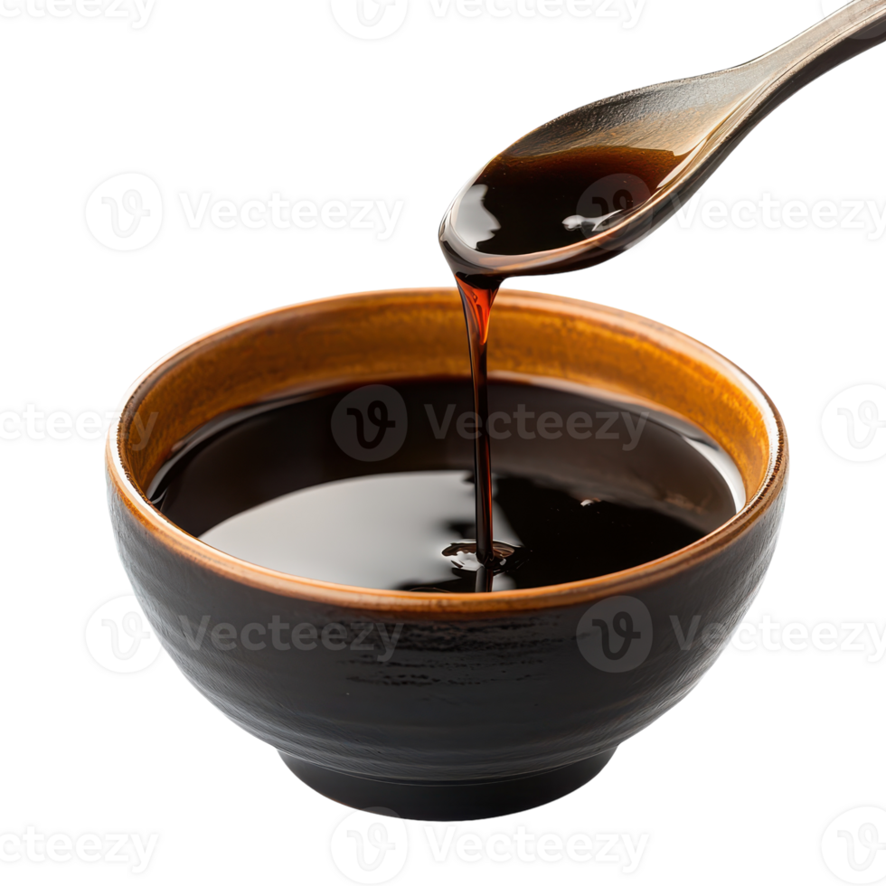 A spoon is pouring syrup into a bowl of brown sauce png