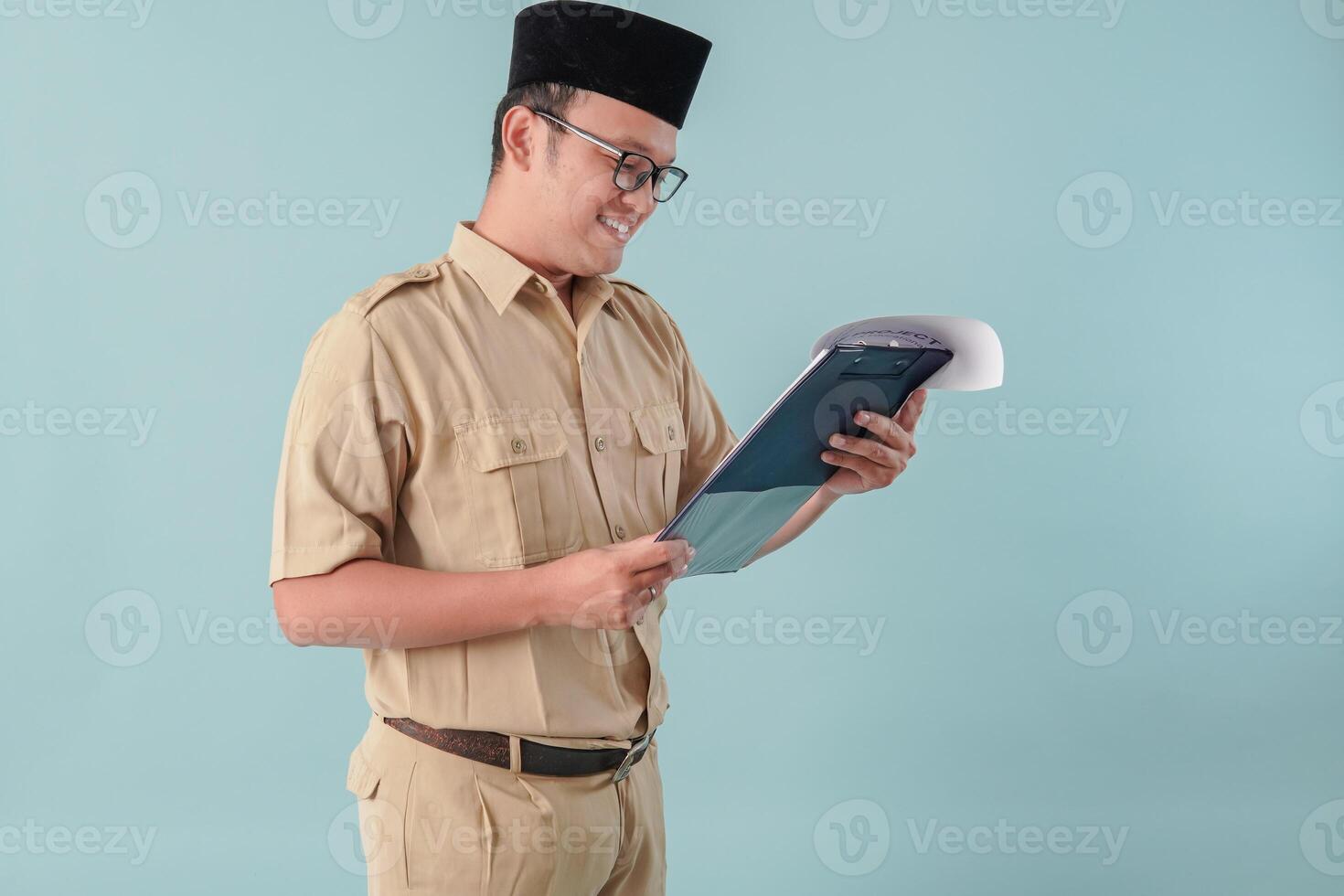 Young government worker man reading document paper or report with serious expression. photo