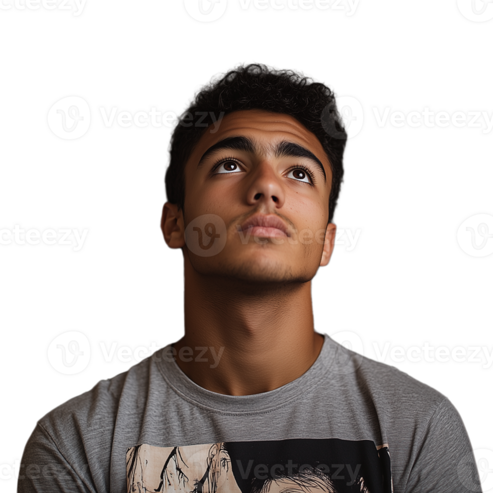 Young man gazing upward with a thoughtful expression, wearing a graphic tee png