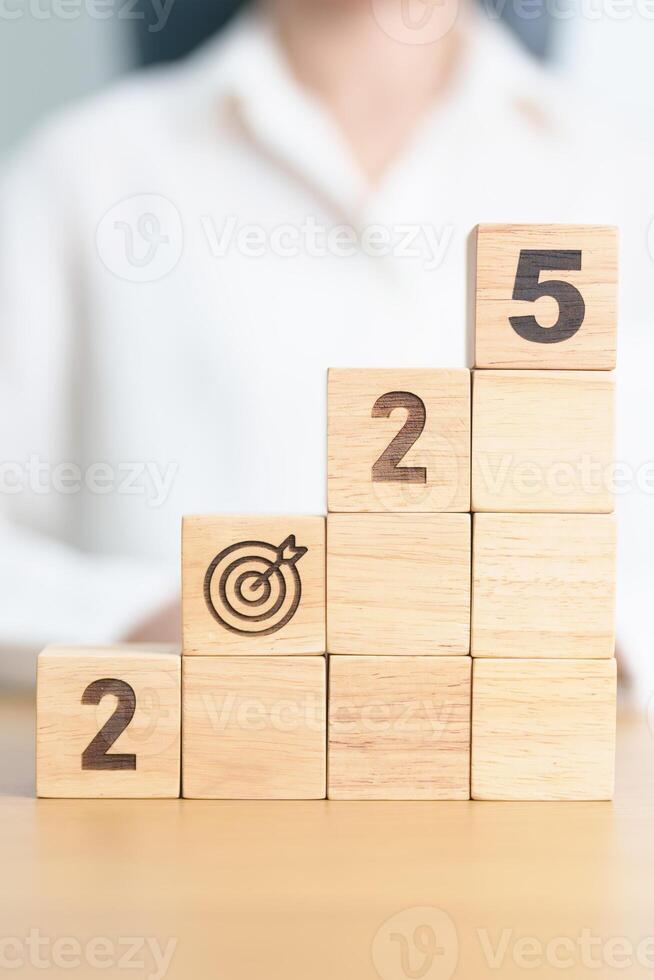 2025 year block with dartboard icon. Goal, Target, Resolution, strategy, plan, Action, mission, motivation, and New Year start concepts photo