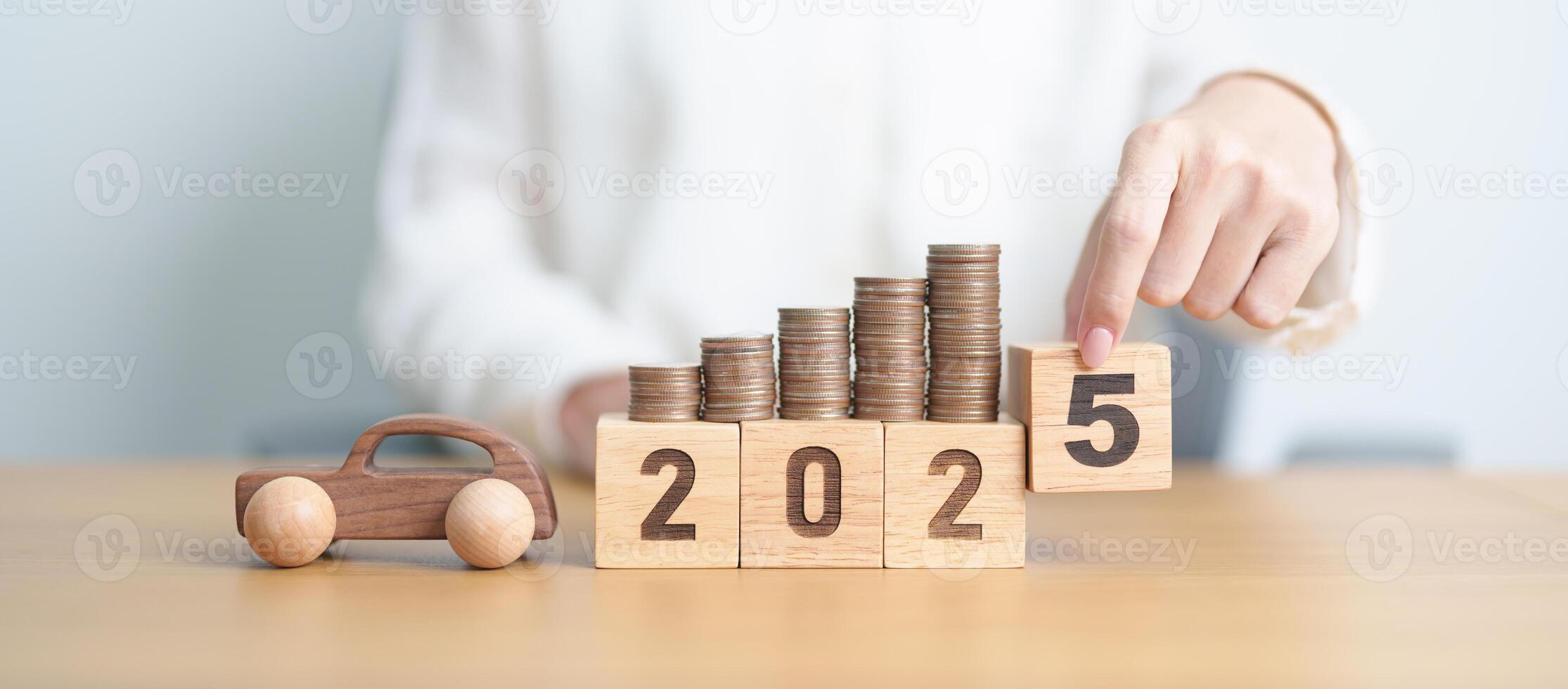 Happy New Year 2025 with car model and Coins Money stack for deposit and Automobile Tax. Money Saving, Car Insurance, Financial, vehicle Repair and Maintenance and New Year concept photo