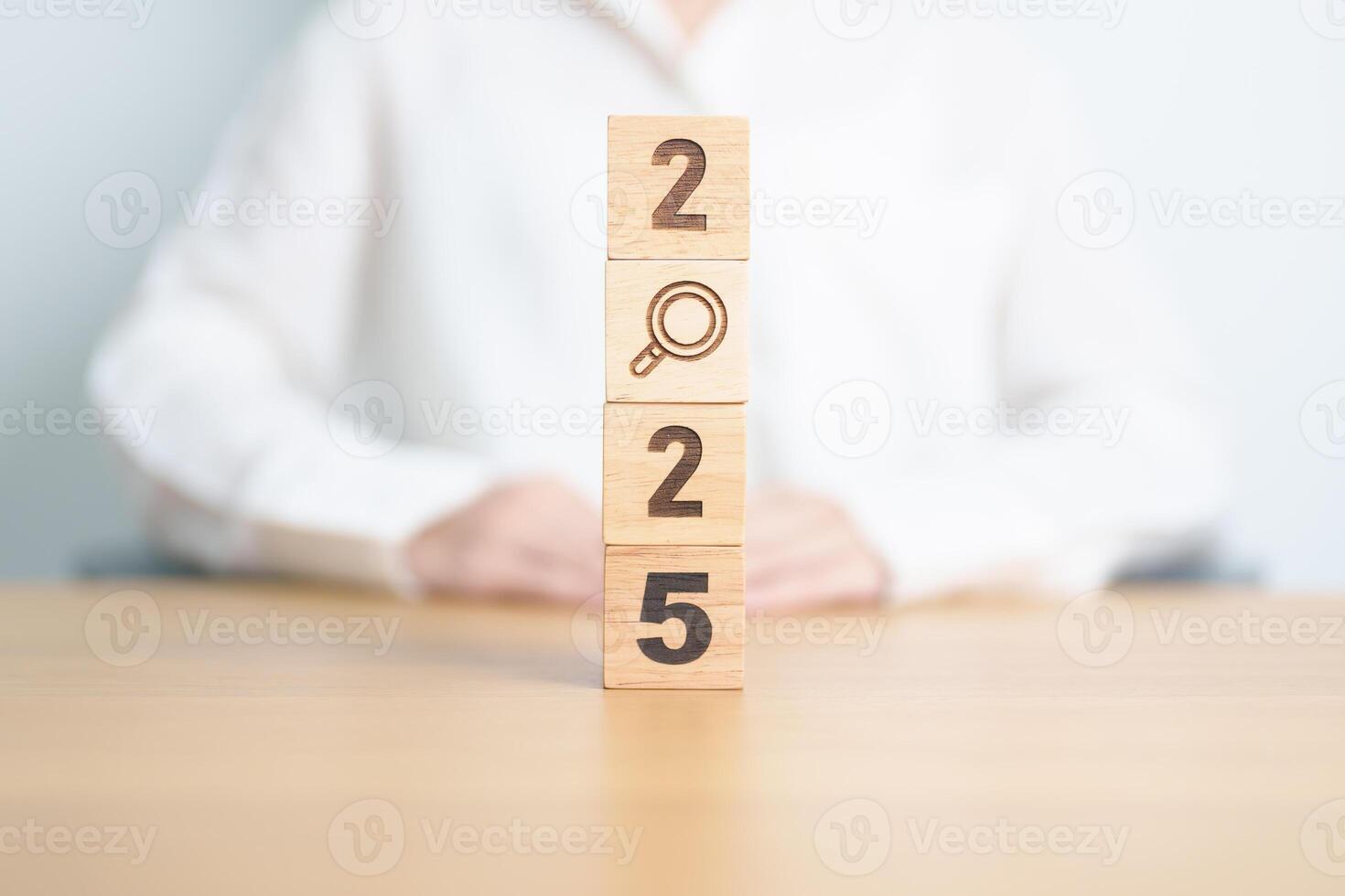2025 block with magnifying glass icon. SEO, Search Engine Optimization, hiring , Advertising, Idea, Strategy, marketing, Keyword, Content and New Year start concepts photo