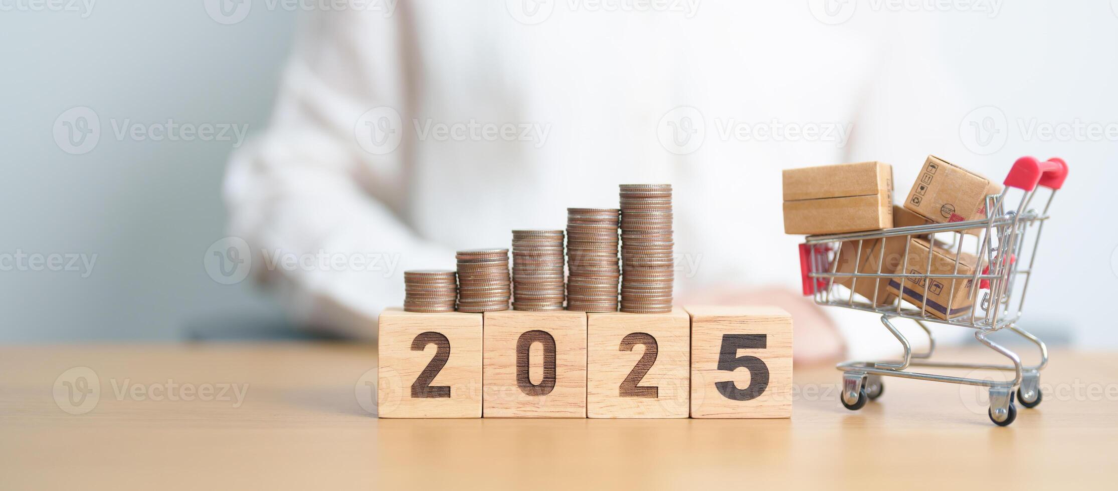 Happy New Year 2025 with shopping cart and money coins stack. online shopping, Marketplace platform website, technology, ecommerce, shipping delivery, logistics and online payment photo