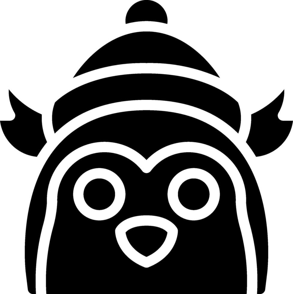 A black and white penguin with a hat vector