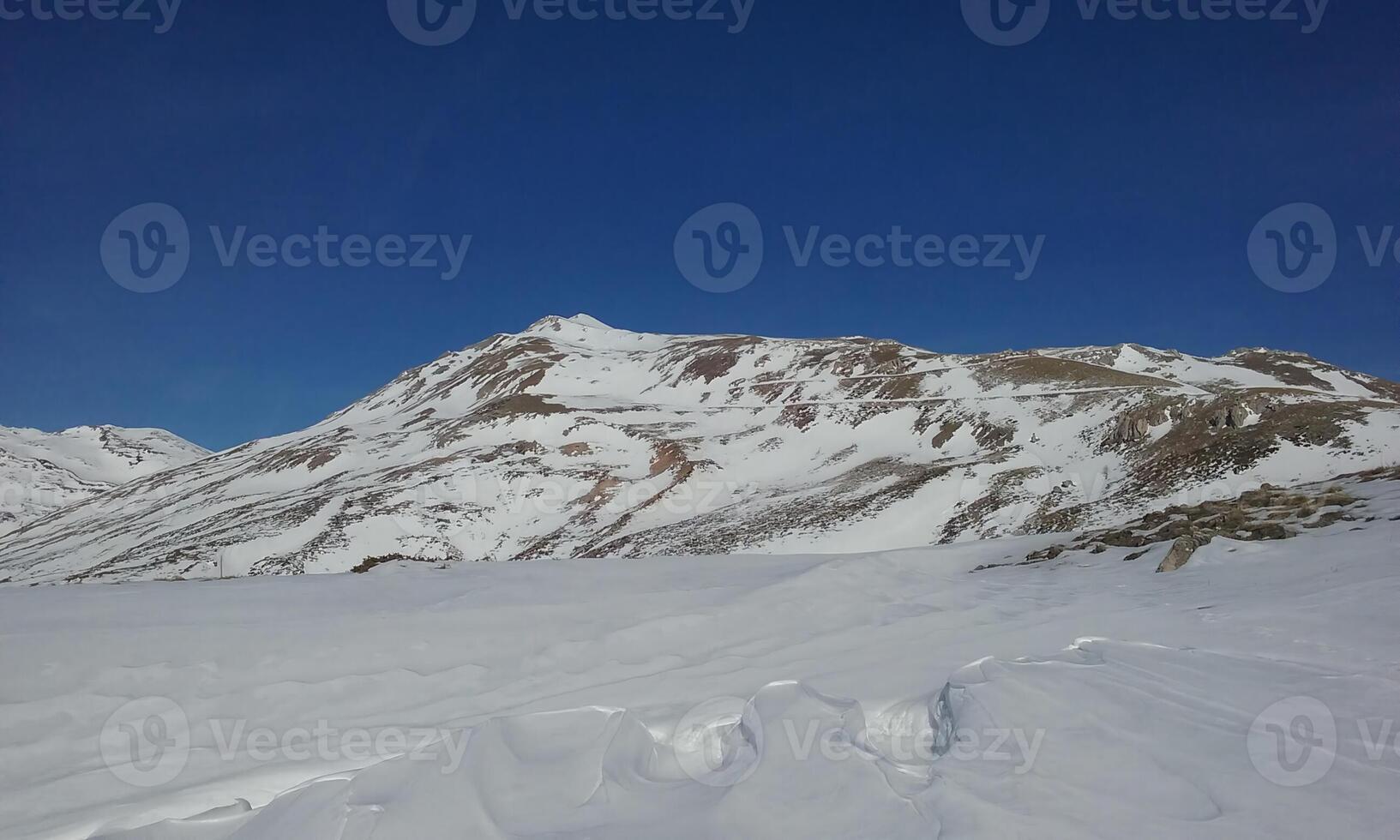 View of Ljuboten peak on Shar Mountain, on a sunny winter day photo