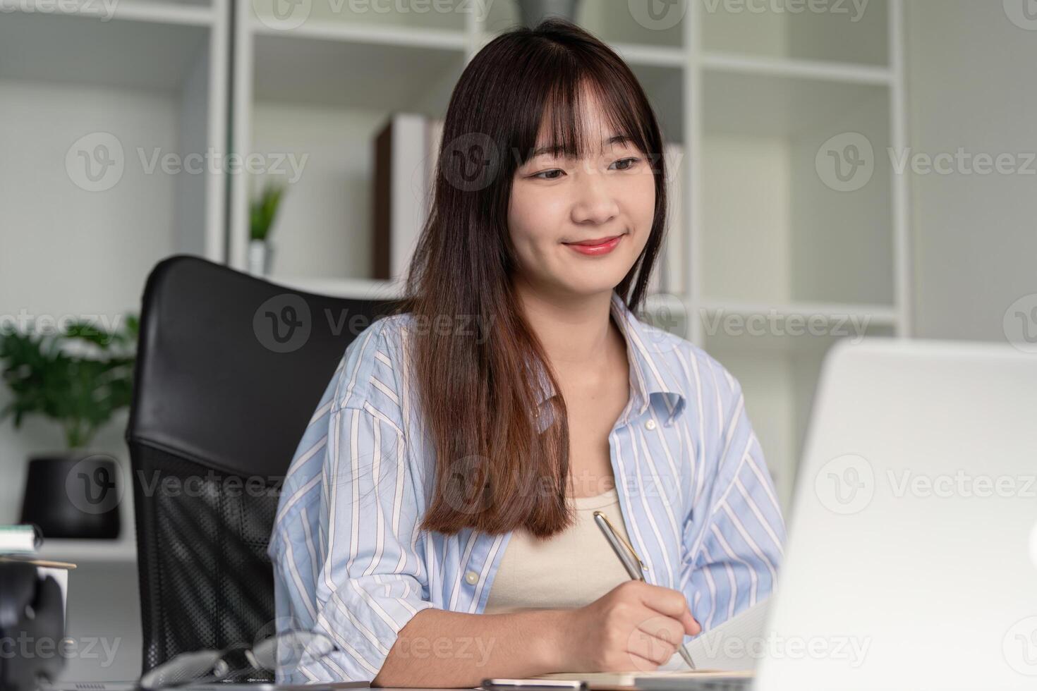 Smiling Student Engaged in an Interactive Online Class photo