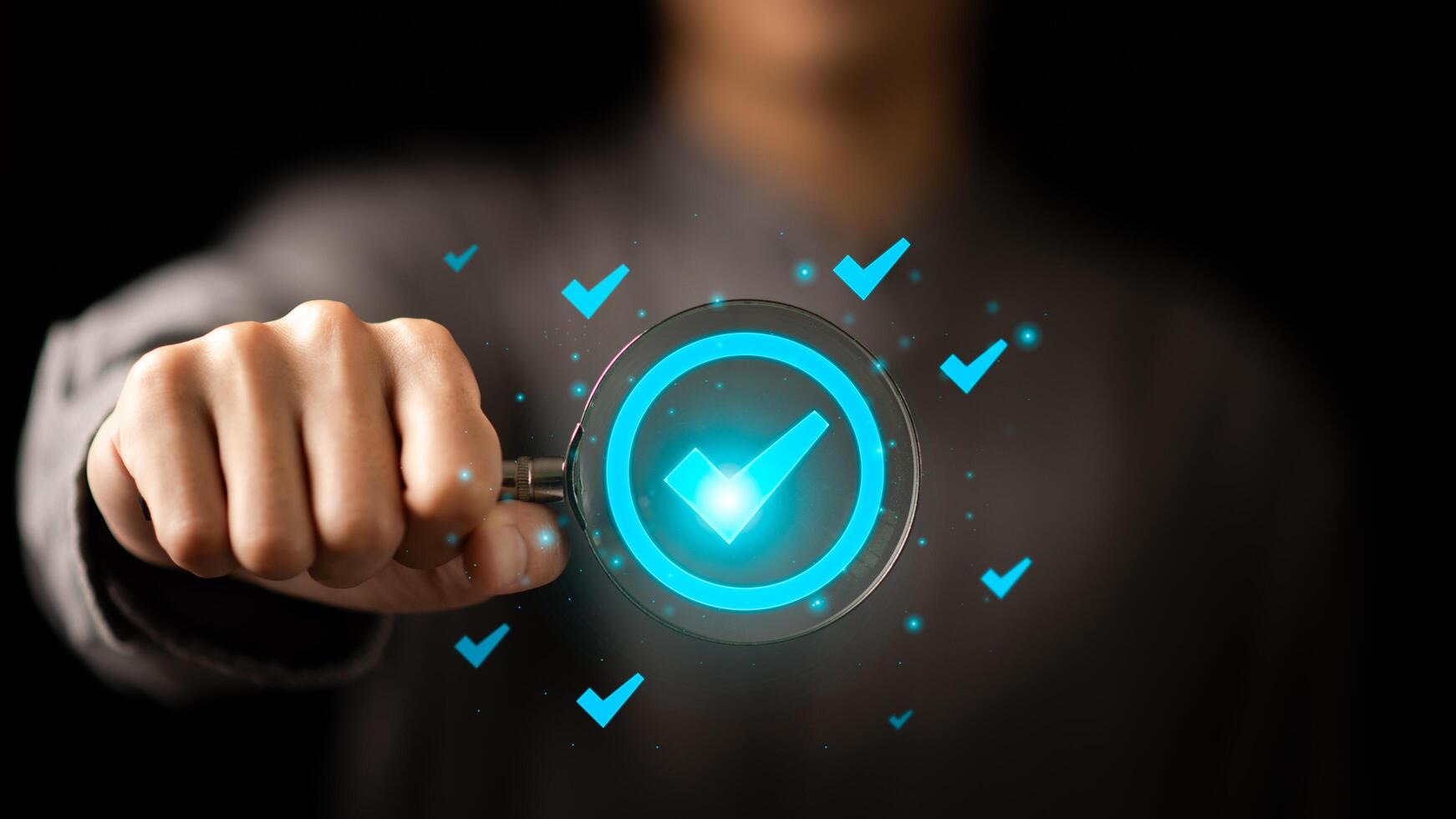 Businessman holding a magnifying glass, showing Audit Document concept,quality assessment management With a checklist, business document evaluation process, market data report analysis and consulting photo