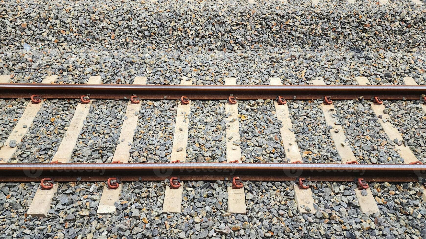 Railway tracks in the train station, closeup of photo. photo