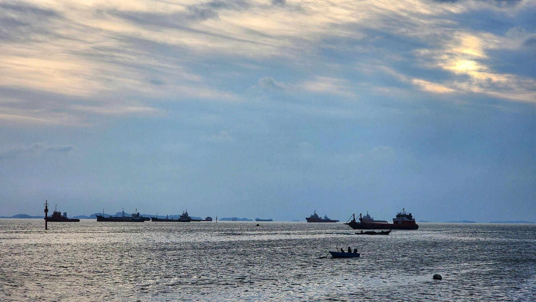 a large body of water with several ships in it photo