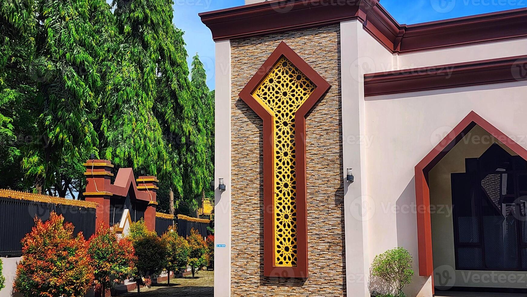 a mosque with a decorative design on the side photo