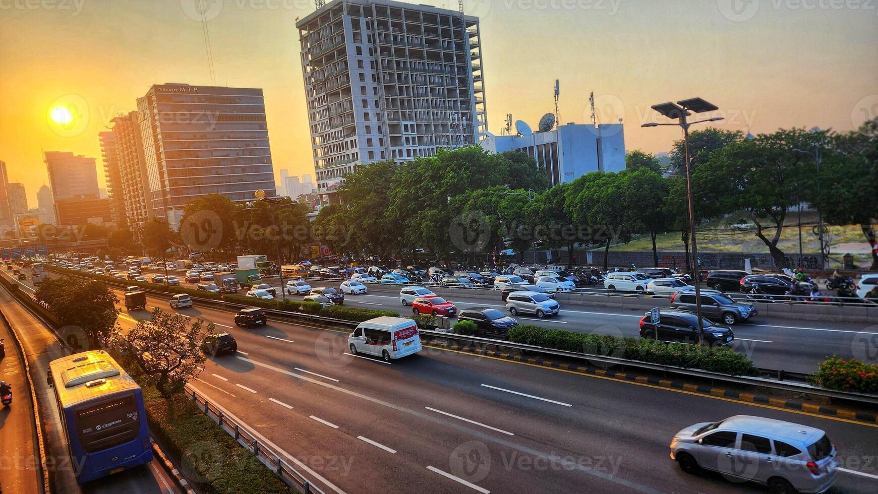 Traffic on the road in Jakarta, Indonesia photo