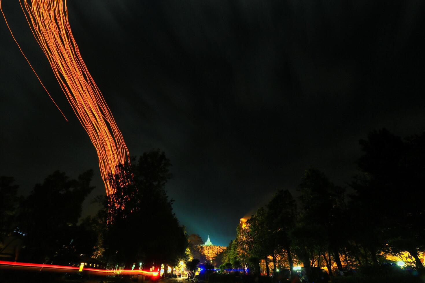 a long exposure photograph of a long streak of light photo