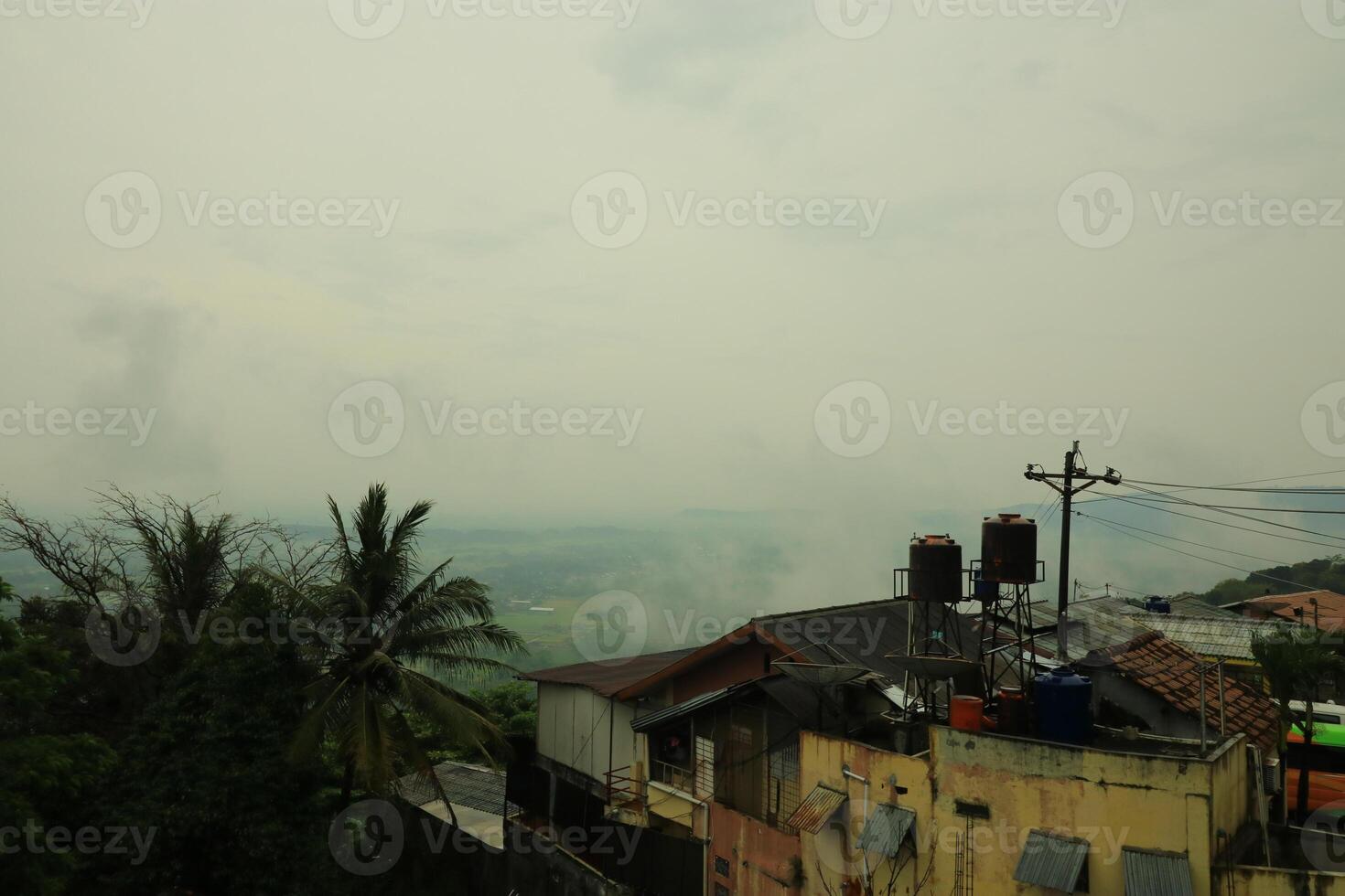 a view of the city from the roof of a building photo