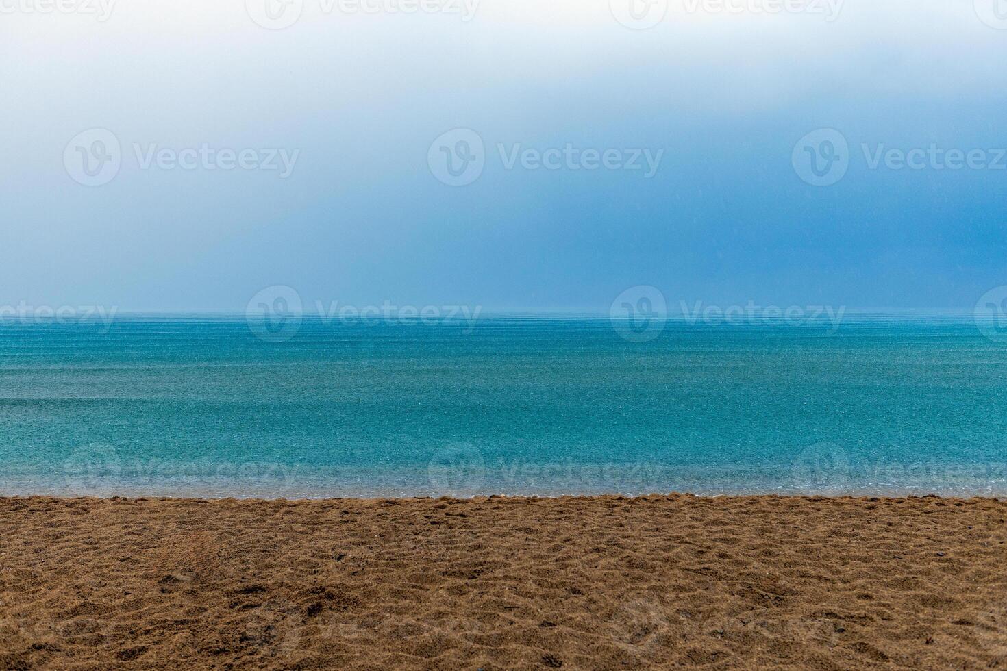 blue sky with flakes of clouds and a wedge of migratory birds photo