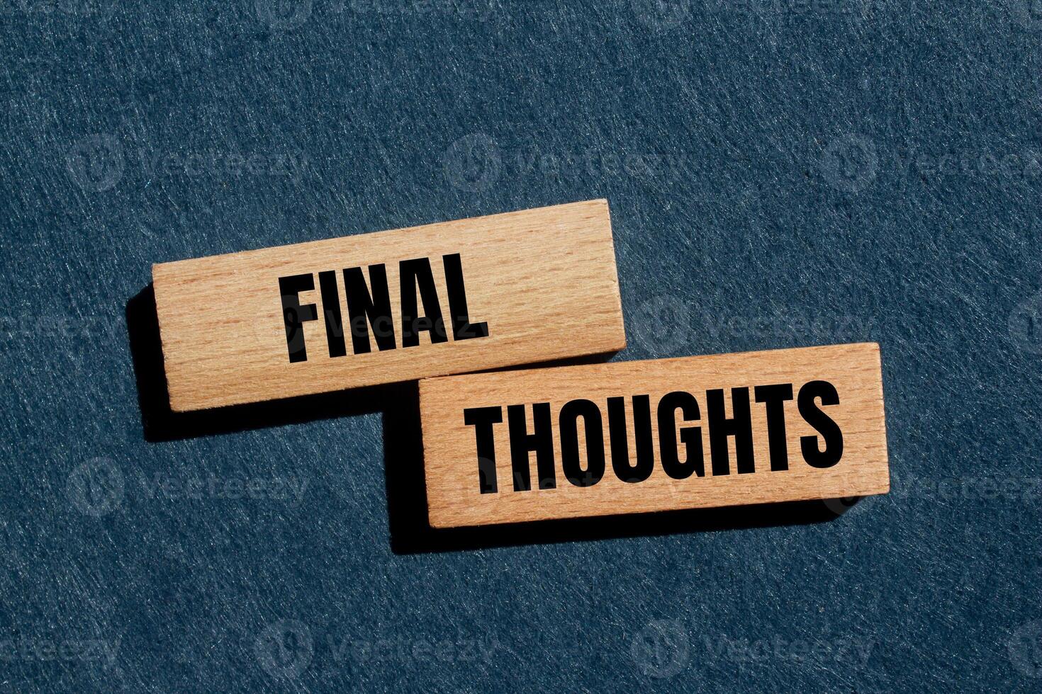 Final thoughts message written on wooden blocks with gray background. Conceptual final thoughts symbol. Copy space. photo