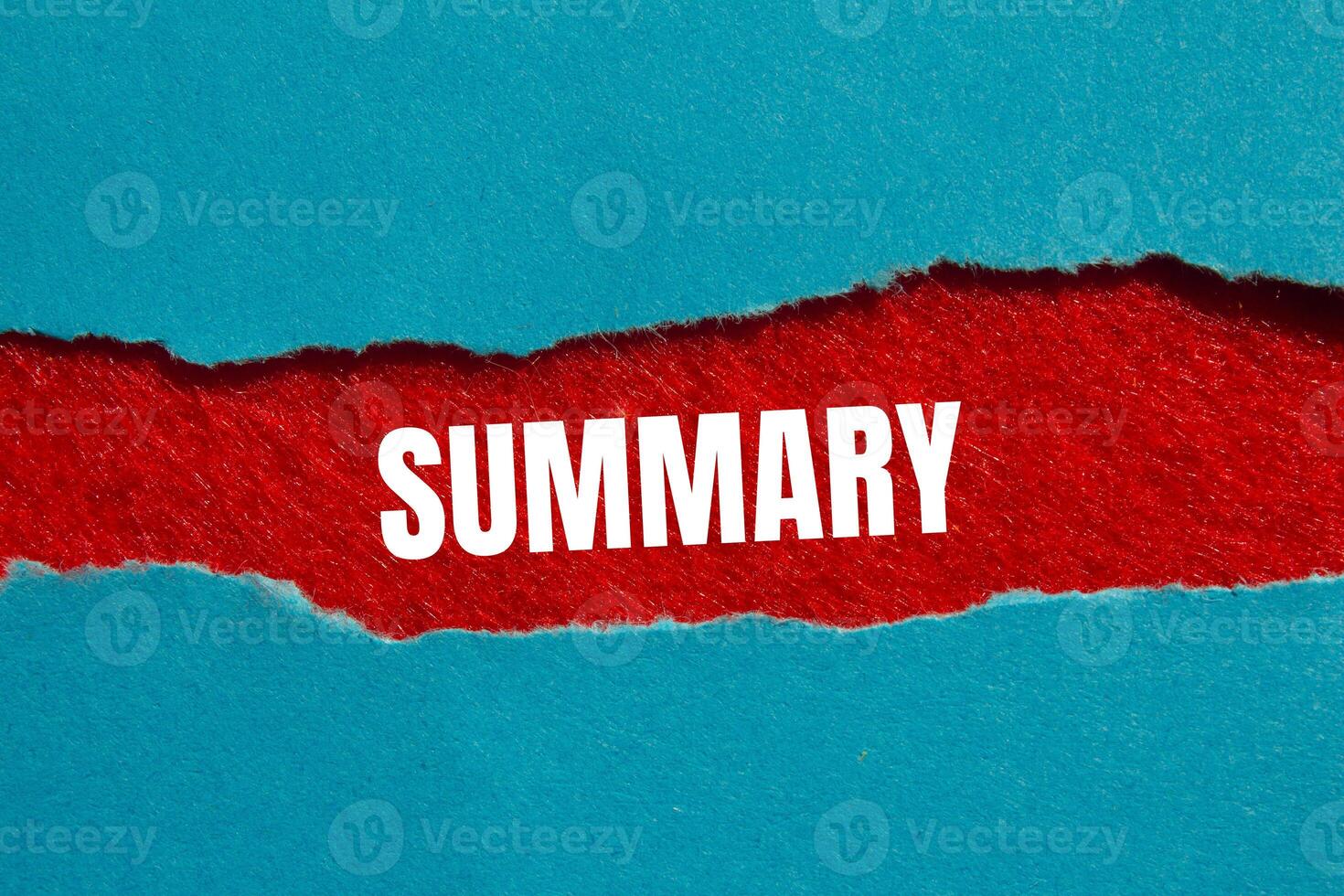 Summary message written on ripped torn blue paper on red background. Conceptual summary symbol. Copy space. photo