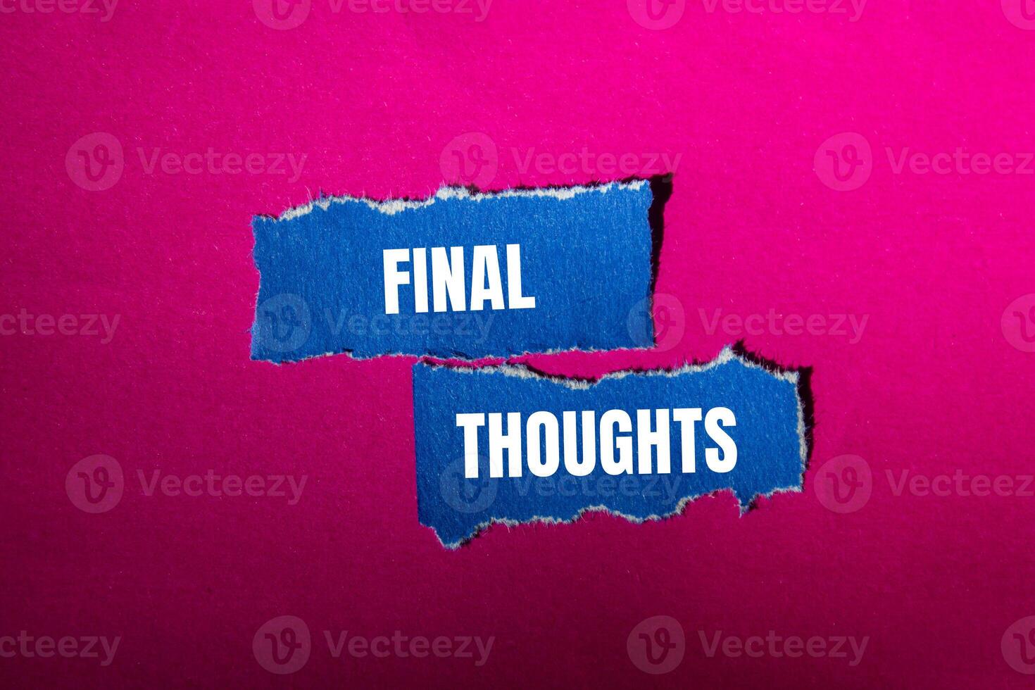 Final thoughts message written on ripped torn blue paper pieces with pink background. Conceptual final thoughts symbol. Copy space. photo