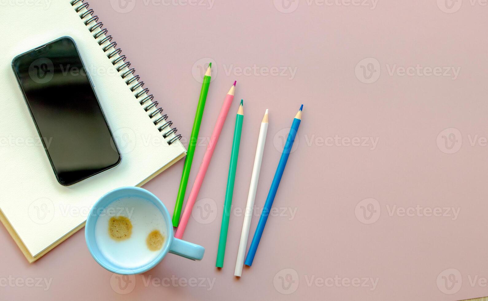 education and office aesthetic concept. pen and notebook on a plain pink background, copy space, web banner photo
