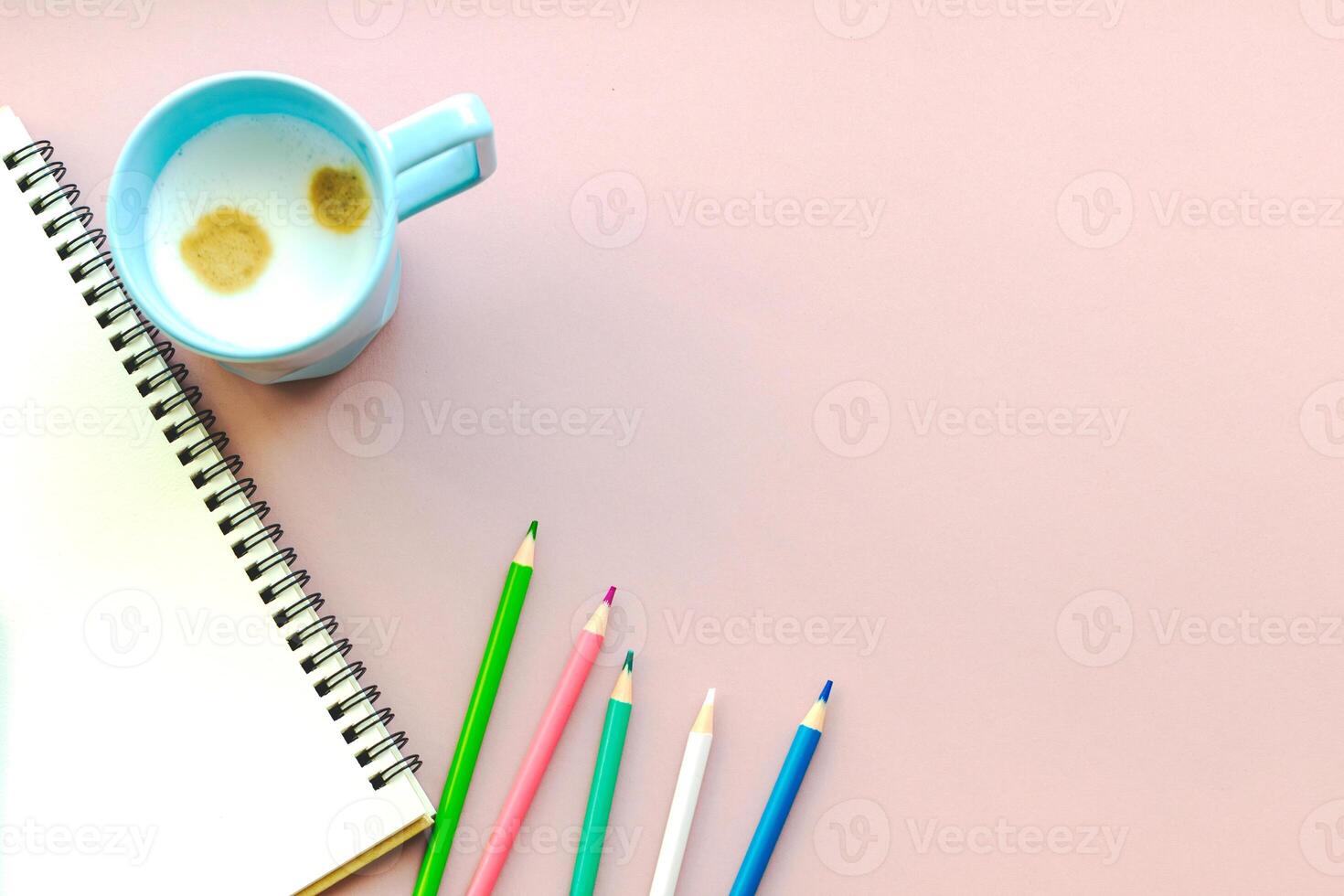 education and office aesthetic concept. pen and notebook on a plain pink background, copy space, web banner photo