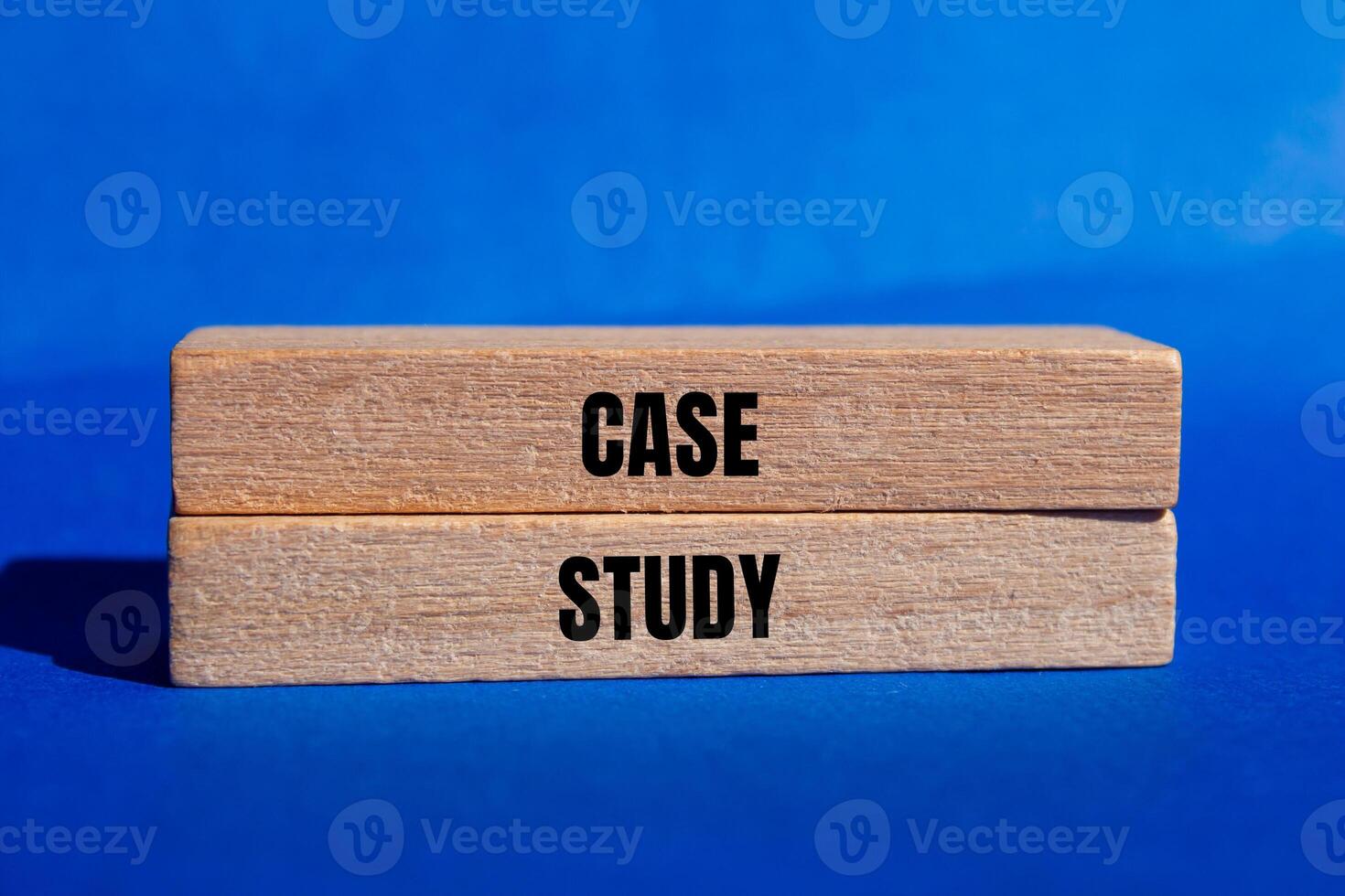 Case study message written on wooden blocks with blue background. Conceptual case study symbol. Copy space. photo