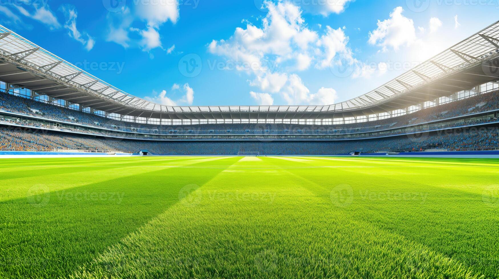 The football stadium is empty during the day. Clean grass, no markings. Copy space. Horizontal format. photo