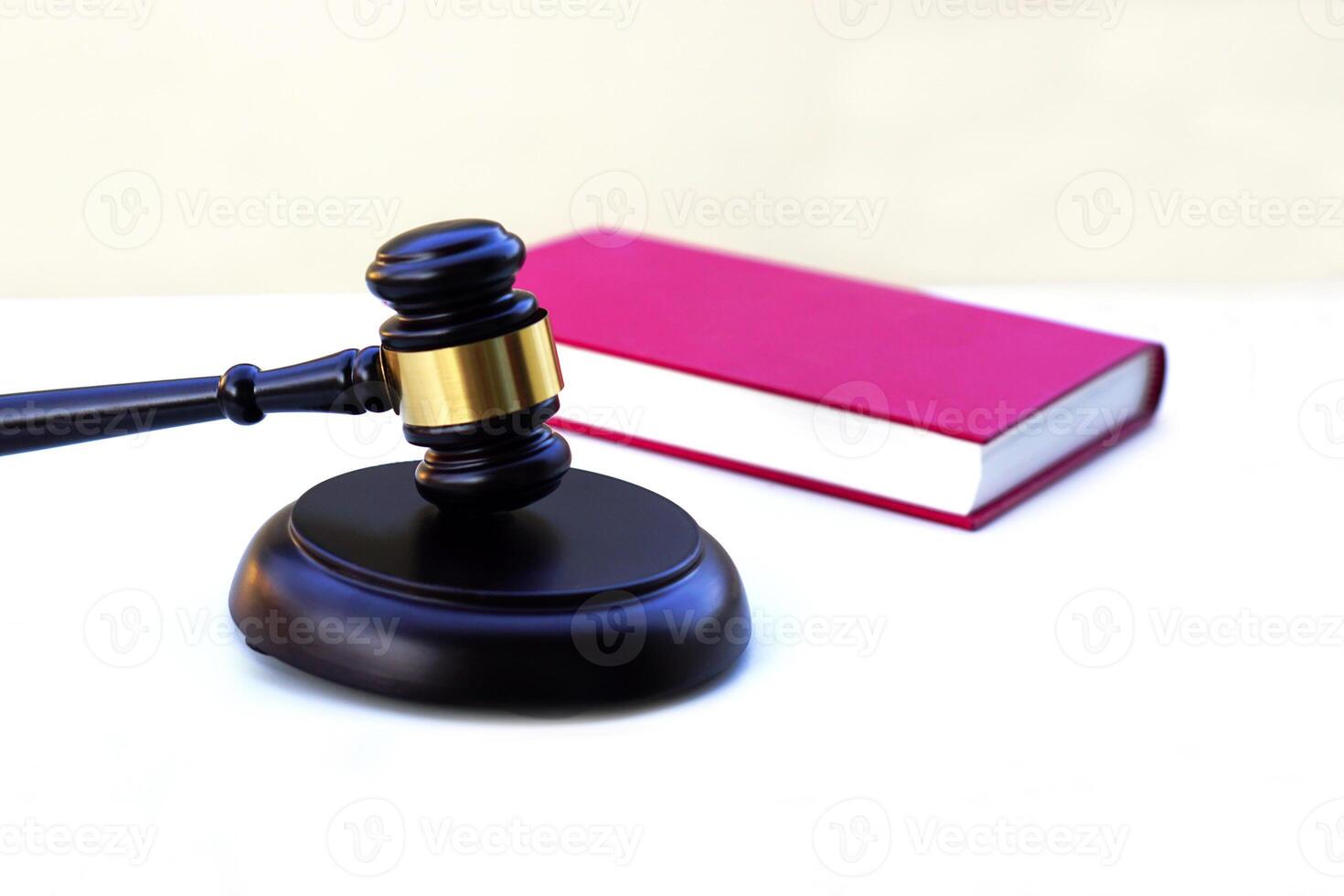 Selective focus, judge gavel, lawyer, law, justice with law book in background. photo