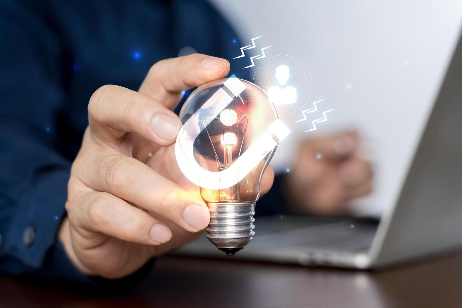Finding and identifying customers. Lead Generation concept. Businessman using laptop with lead generation icon on virtual screen. photo