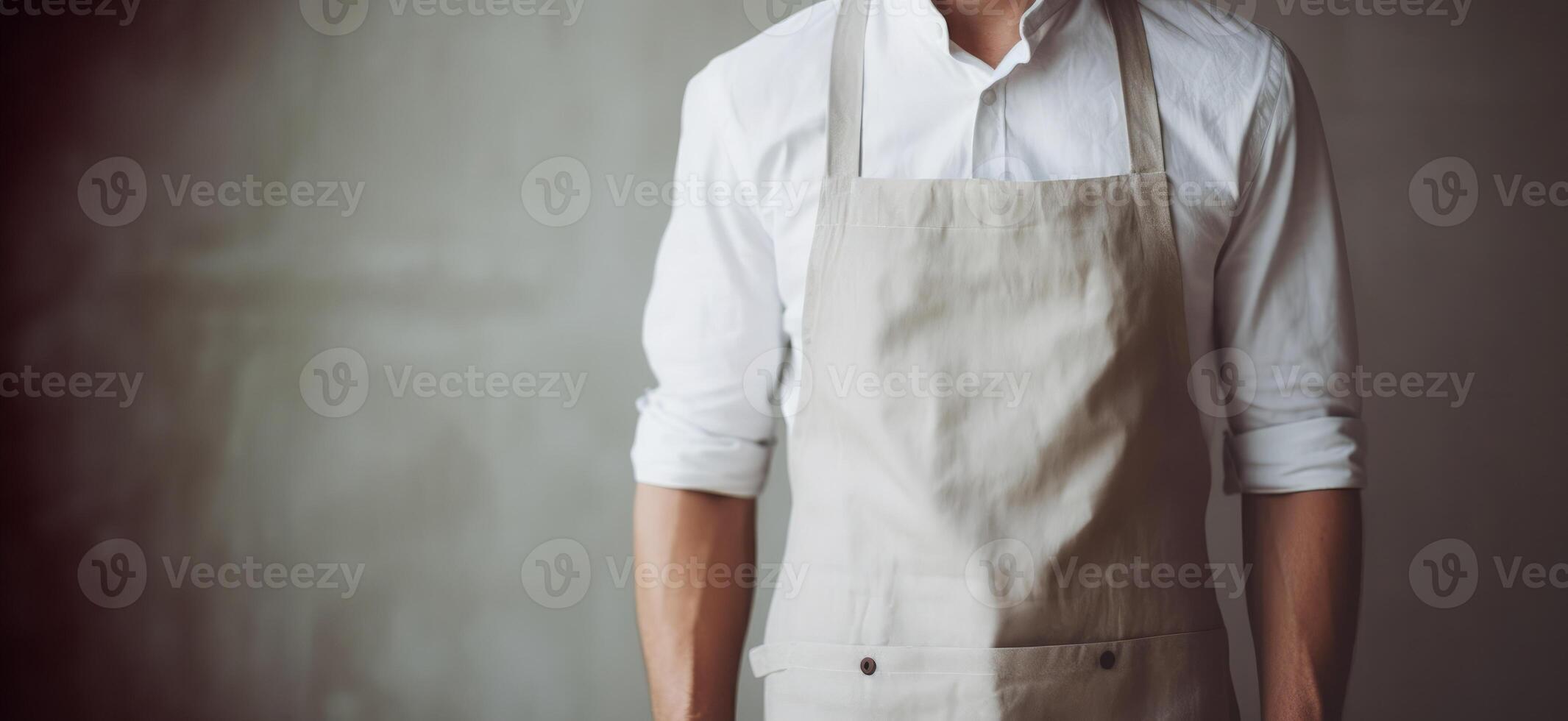Man wearing beige linen apron mock up in the modern kitchen, chef uniform for cooking photo