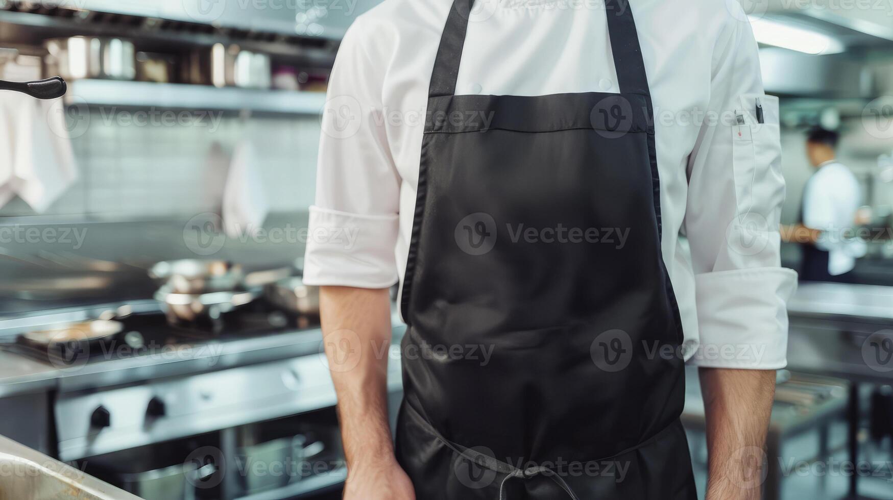 Man wearing black apron mock up in the modern kitchen, chef uniform for cooking photo