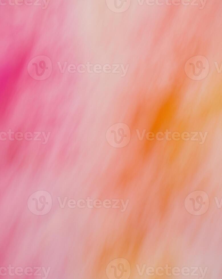 Abstract blurred background of pink, orange and yellow photo