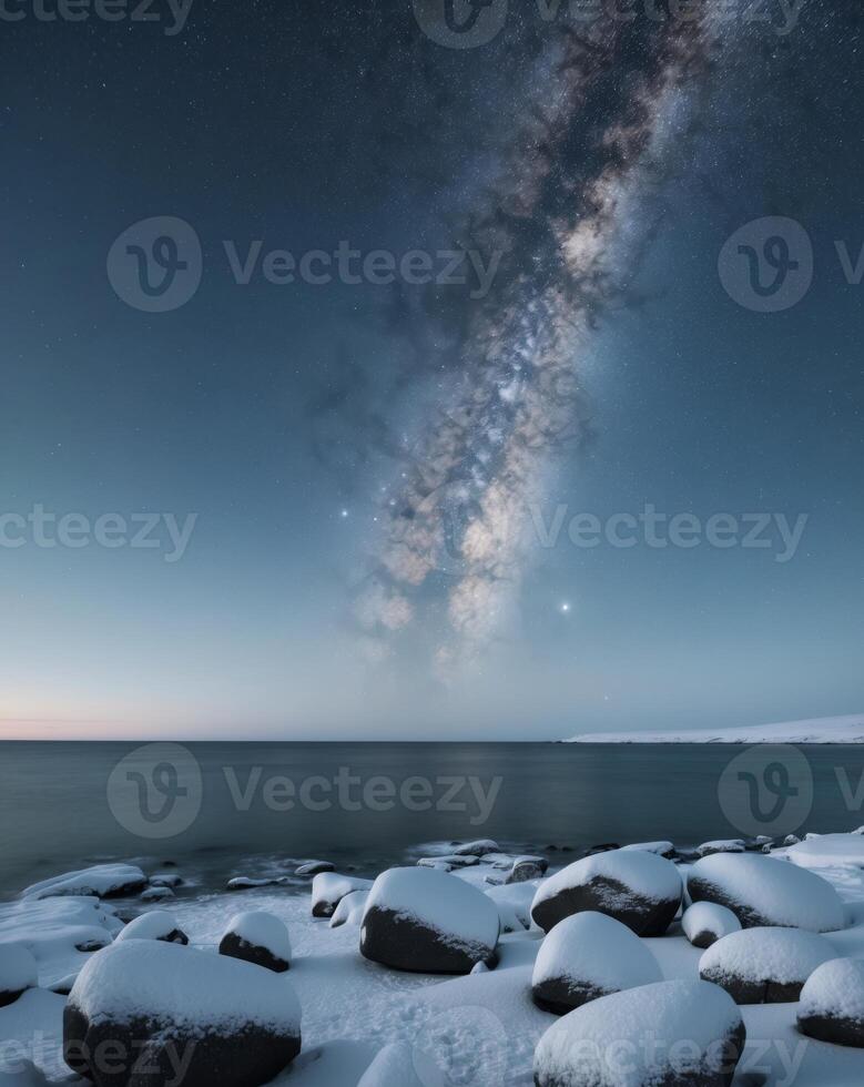 On Winter Nights Snow And Ice Cover The Rocks By The Sea Beautiful Milky Way. photo